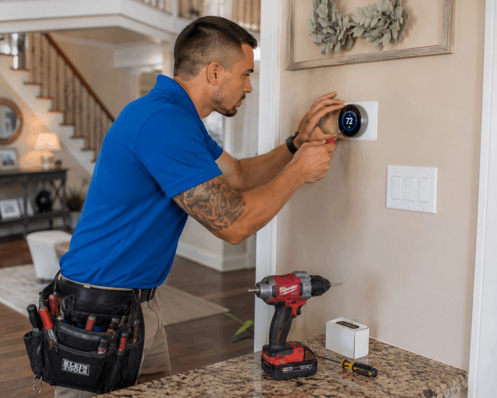 Smart Thermostat Installation by On Call NJ On Call NJ technician installing a smart thermostat set to 72 degrees in a New Jersey home